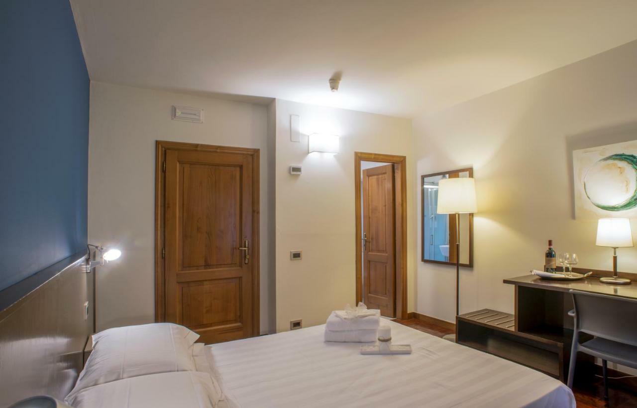 אסיסי Locanda Giustini מראה חיצוני תמונה